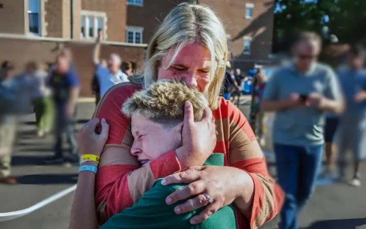 A mother’s embrace amid the chaos in Minnesota: Could stronger safeguards have prevented this tragedy?