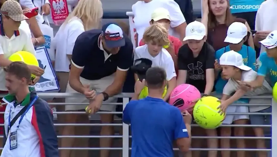 Furore CEO Piotr Szczerek caught stealing a boy’s signed tennis hat at the US Open. Could greed outweigh his millionaire status?