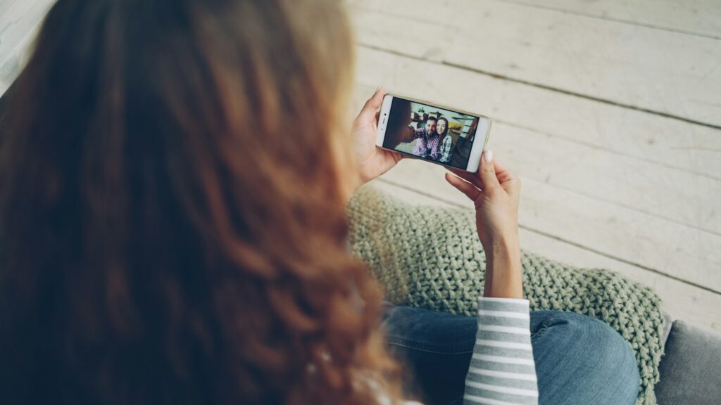 Woman watching a video on a smartphone