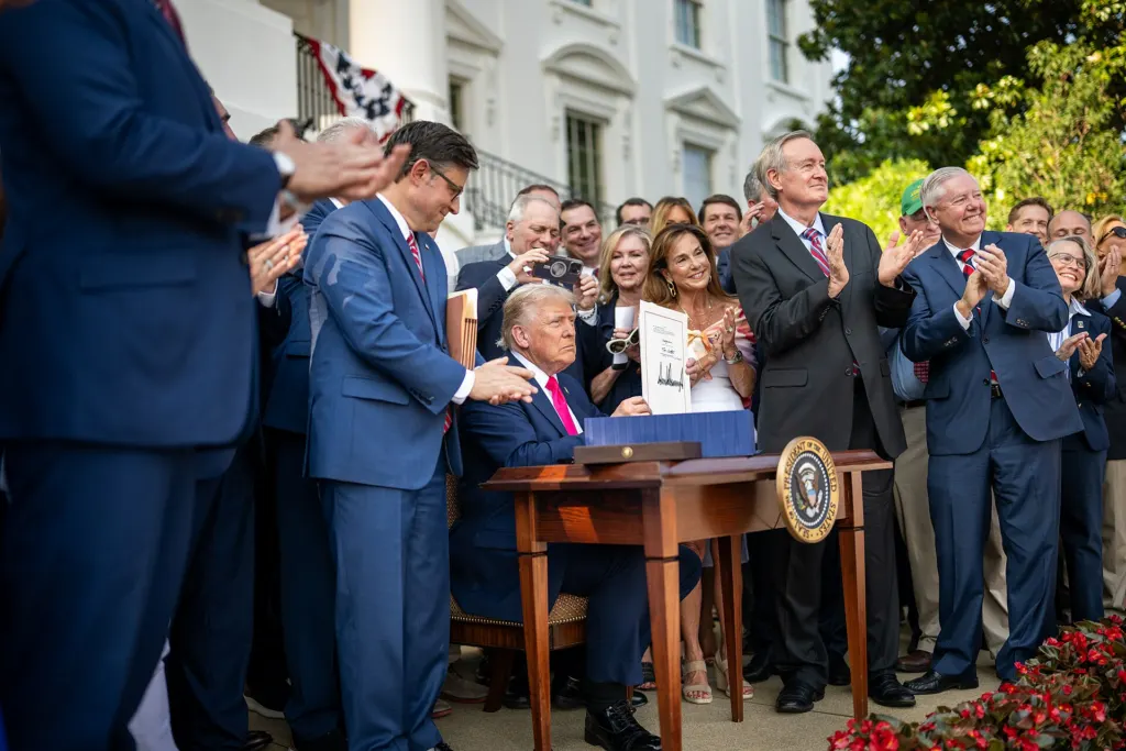 President signing a bill on the White House South Lawn