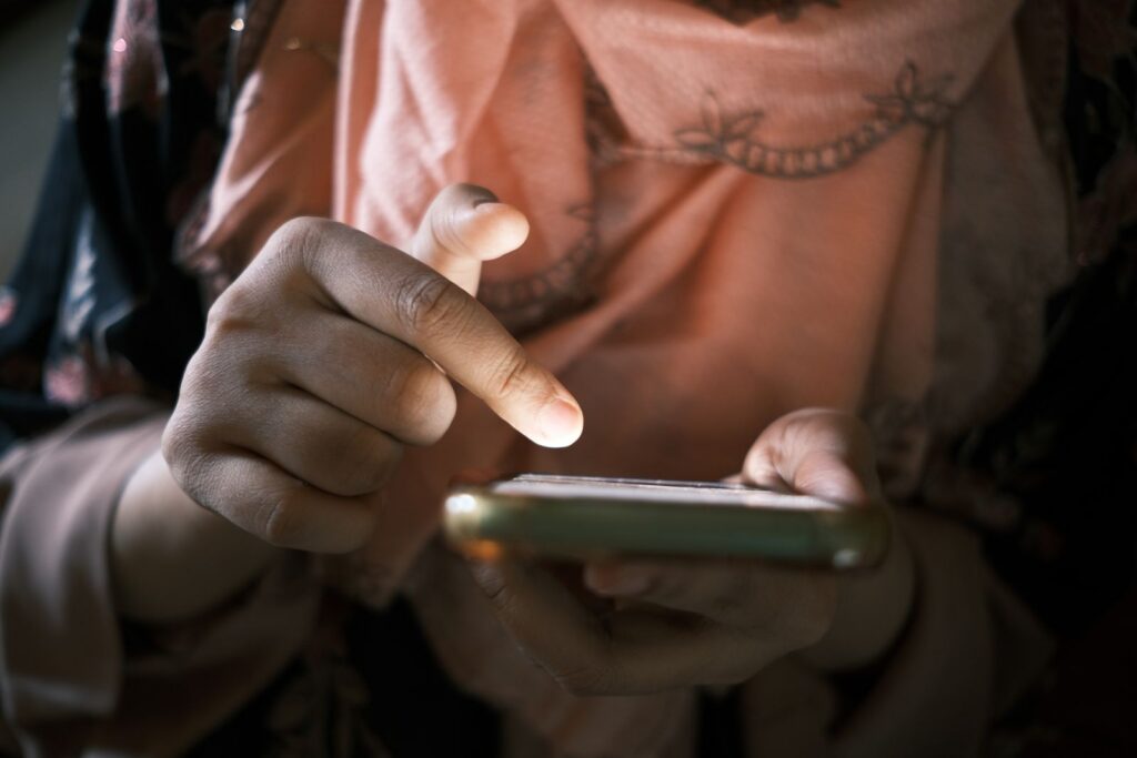 Person scrolling on a smartphone