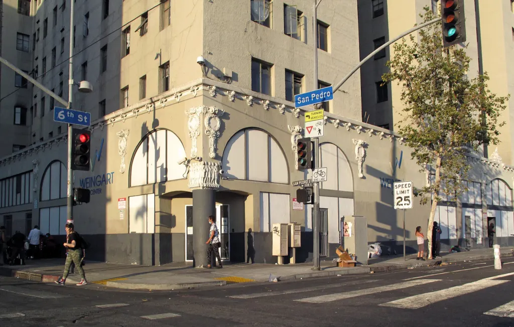 Street corner and buildings at 6th and San Pedro streets in the Skid Row area of Los Angeles