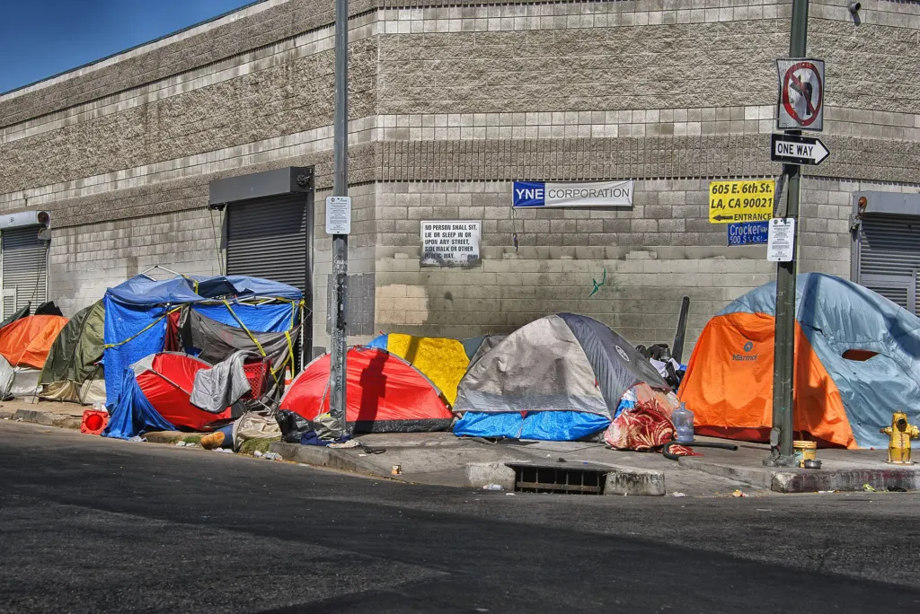 Row of tents lining a sidewalk on Skid Row in downtown Los Angeles