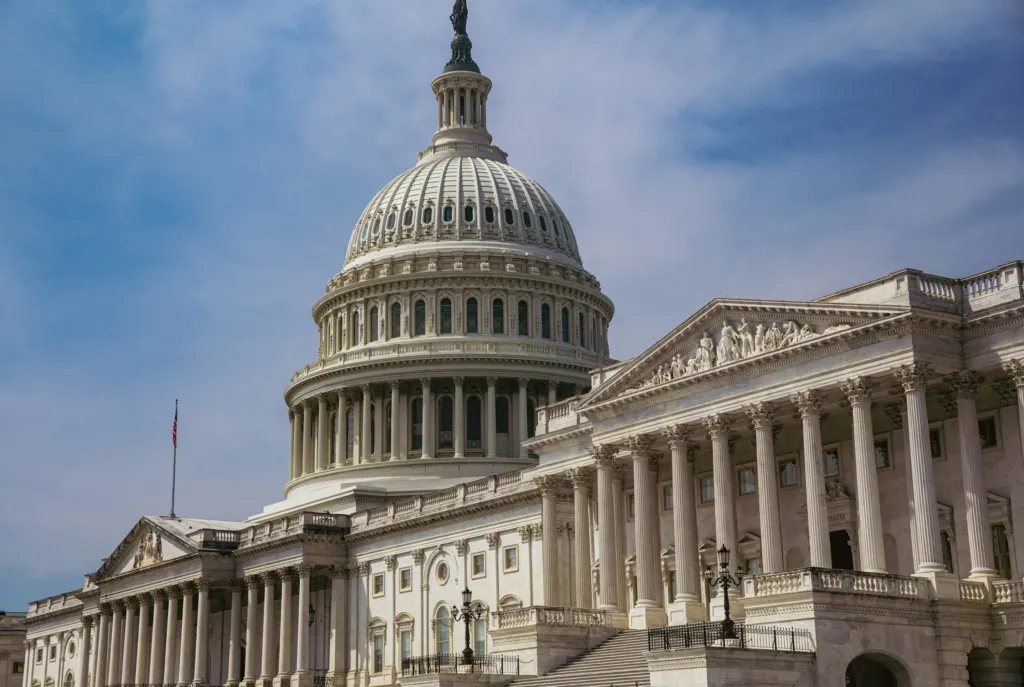 United States Capitol building under a clear blue sky